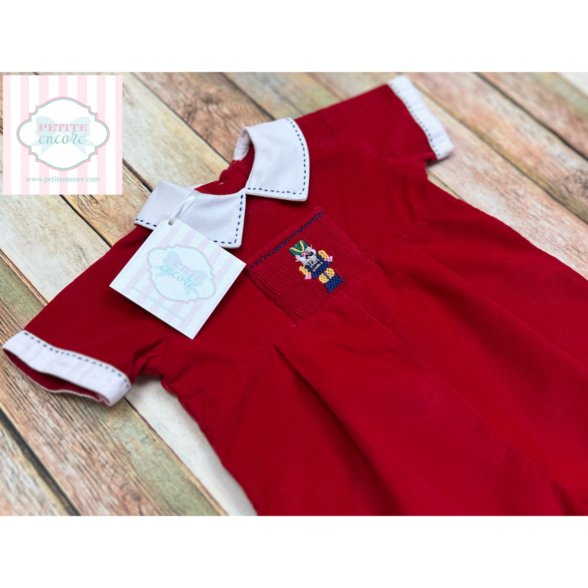 Nutcracker themed smocked one piece 12m Petite Encore