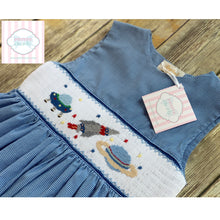 Space themed smocked dress 5